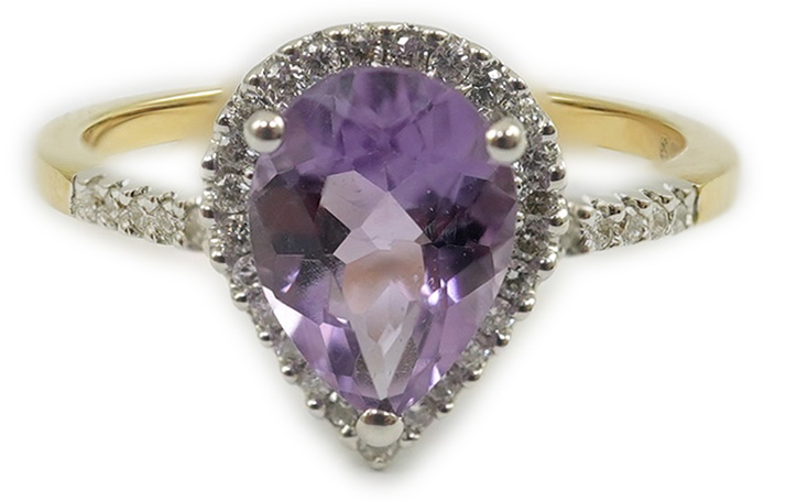 A modern 18ct gold and single stone pear cut amethyst set ring, with diamond chip set border and shoulders, size O, gross weight 3.4 grams. Condition - fair to good